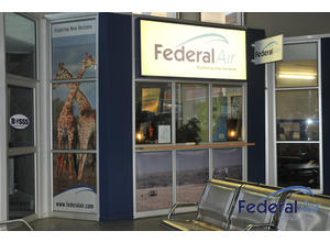 Welcome booth OR Tambo International Airport .